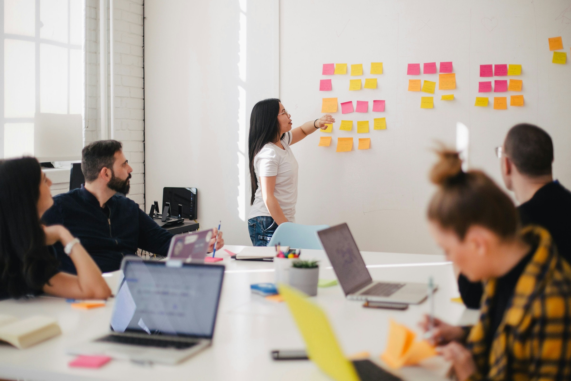 Startup team in a modern office planning a SaaS product